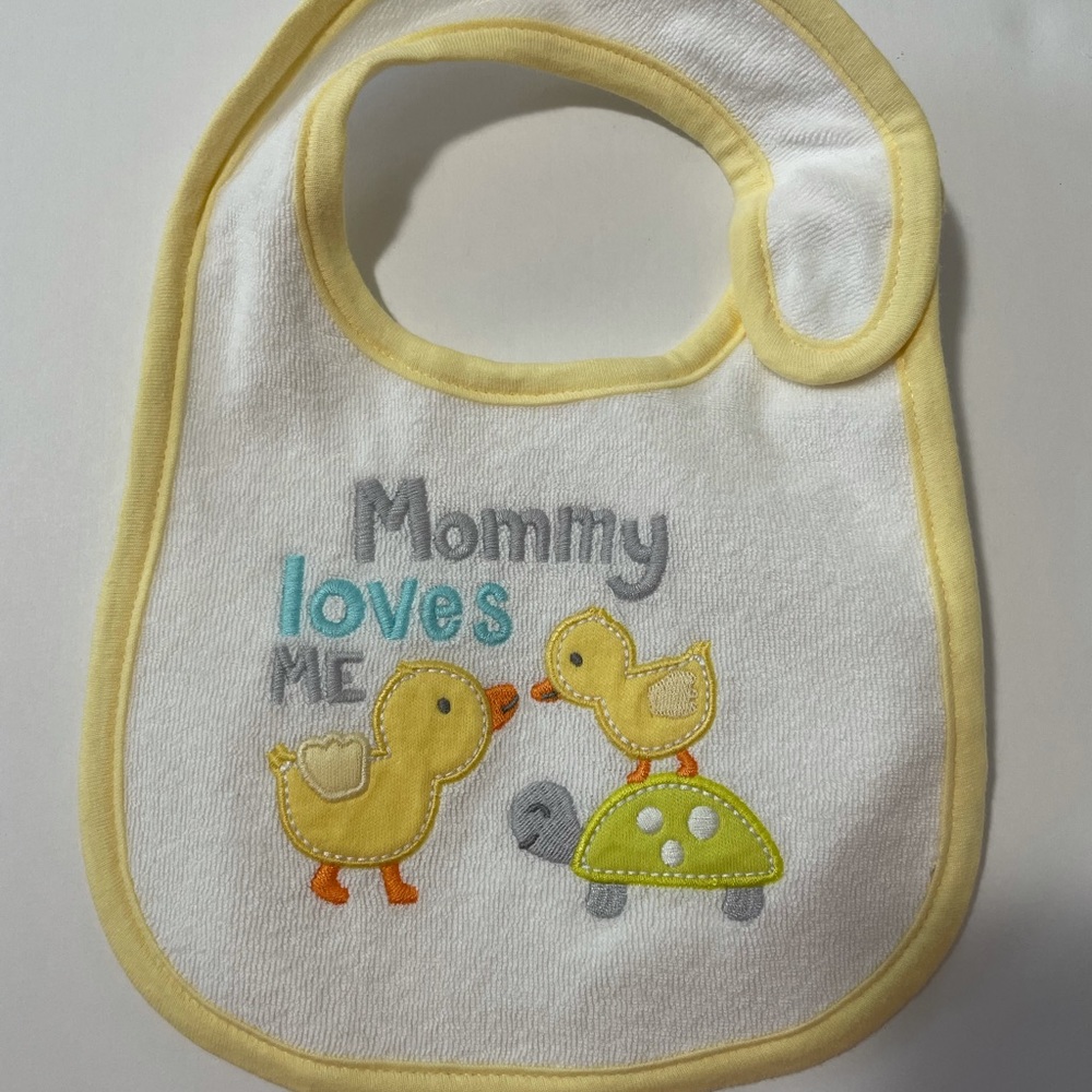 NWOT Carter’s bib.